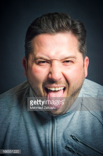 Man Showing Tongue Funny Picture
