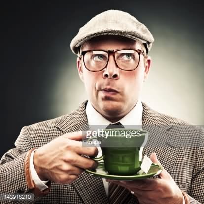 Man With Tea Making Funny Face