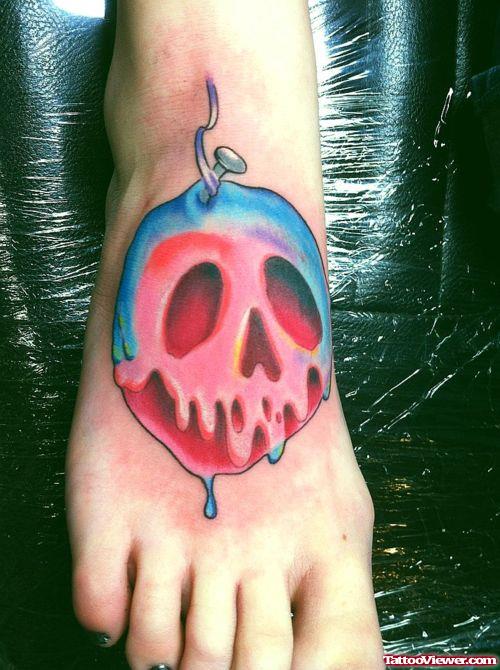 Melting Skull Apple Tattoo On Girl Foot