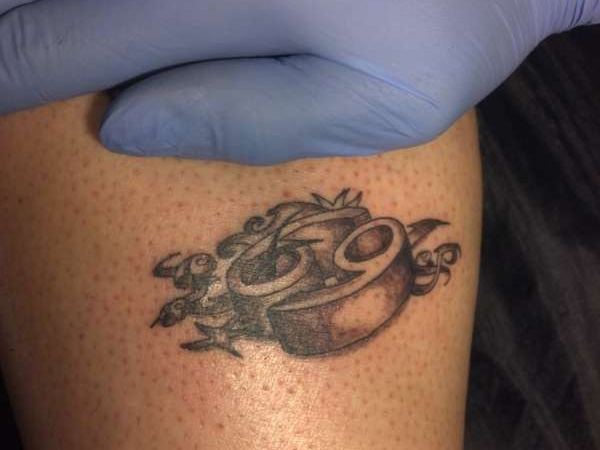 Nice Grey Ink Cancer Zodiac Tattoo On Leg