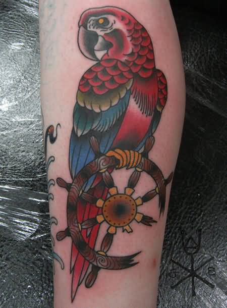 Parrot On Sailor Wheel Tattoo Design For Arm
