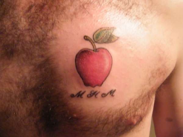 Red Apple Tattoo On Man Chest