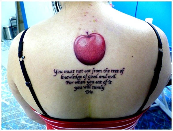 Red Apple With Quote Tattoo On Girl Upper Back