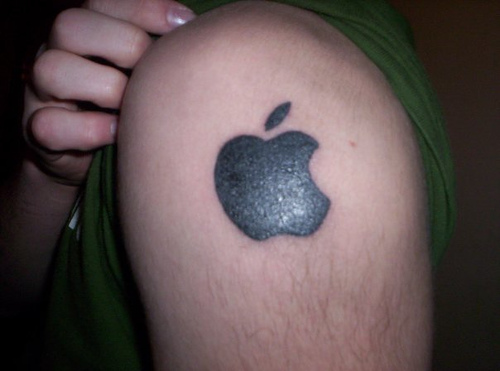 Silhouette Apple Logo Tattoo On Shoulder