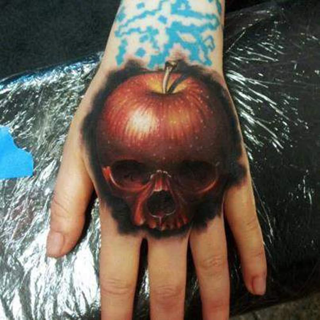 Skull Apple Tattoo On Hand