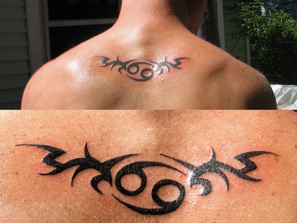 Tribal Cancer Zodiac Tattoo On Man Upper Back