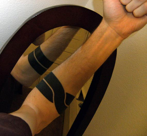 Unique Black Line Armband Tattoo On Forearm