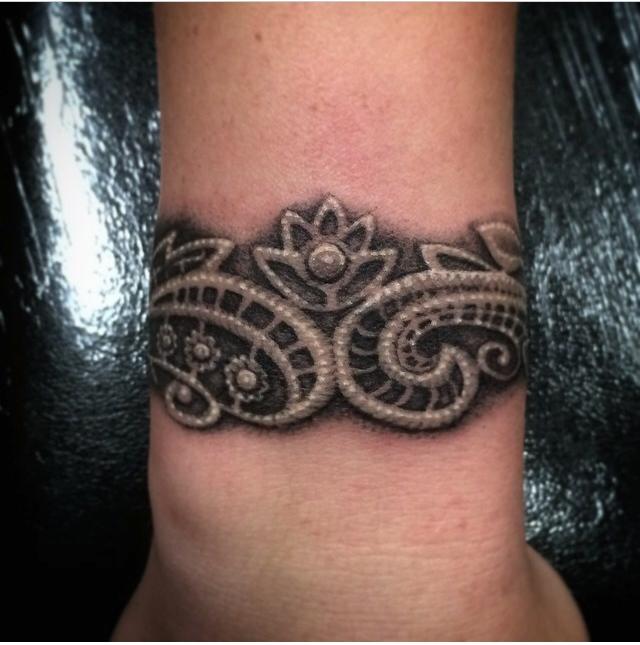 Amazing Wristband Tattoo Design By Bradley Pearce