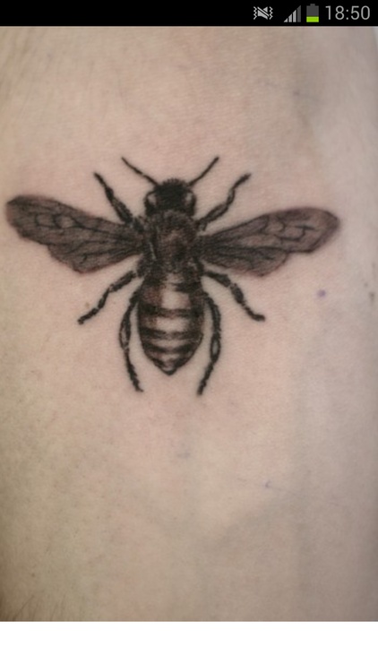 Awesome Black Ink Bee Tattoo Design