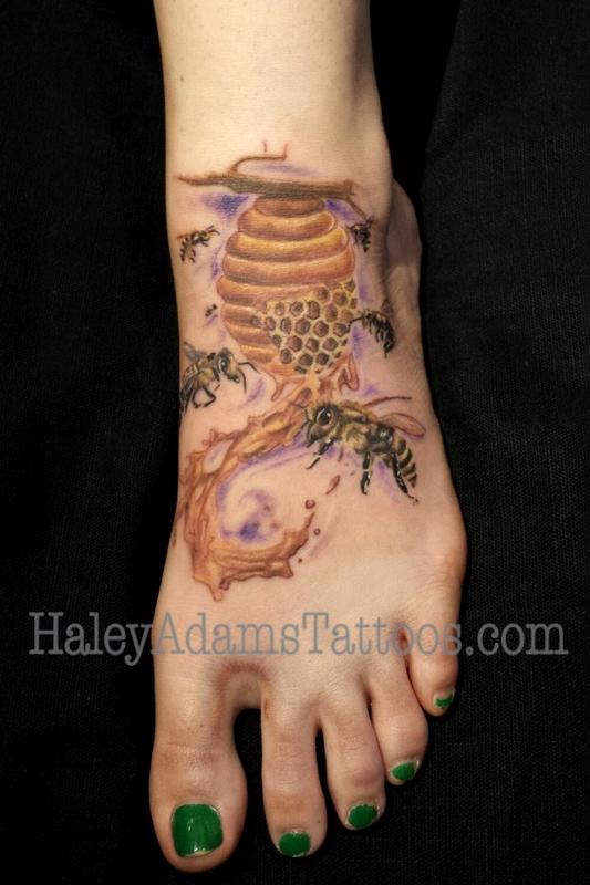 Beehive With Flying Bees Tattoo On Girl Foot