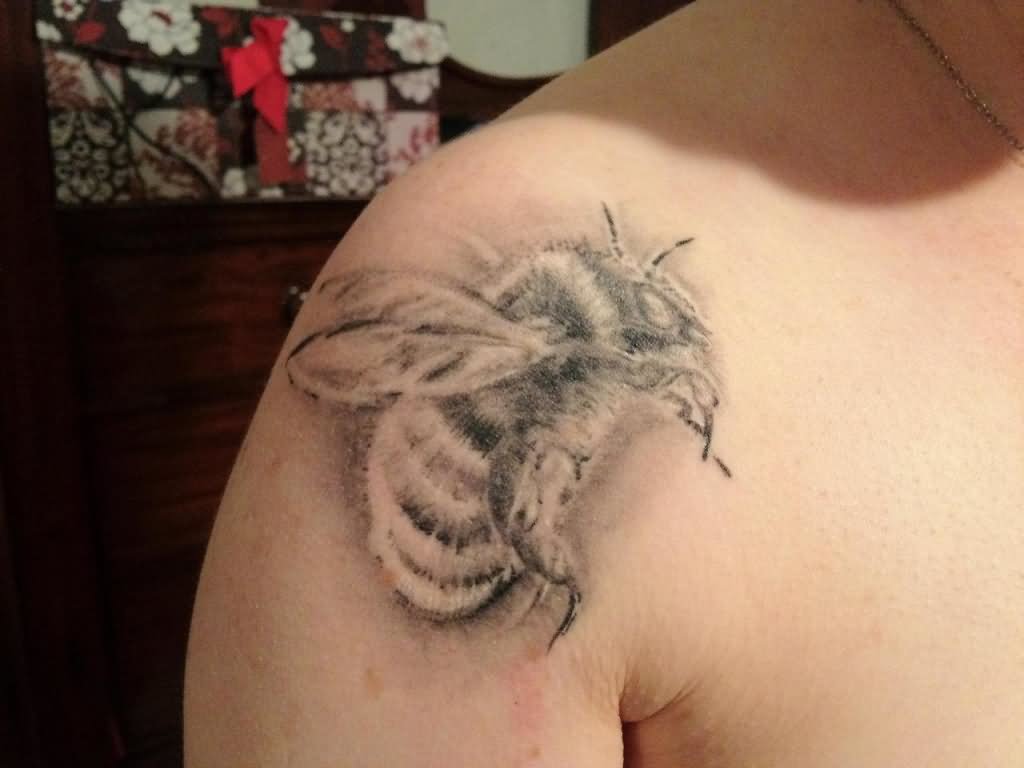 Black And Grey Tattoo On Right Shoulder