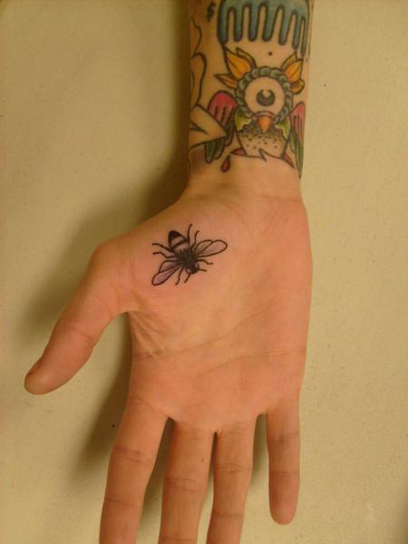 Black Bee Tattoo On Hand Palm
