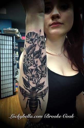 Black Ink Bee And Flowers Tattoo On Girl Right Half Sleeve