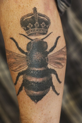 Black Ink Bee With Crown Tattoo Design For Arm