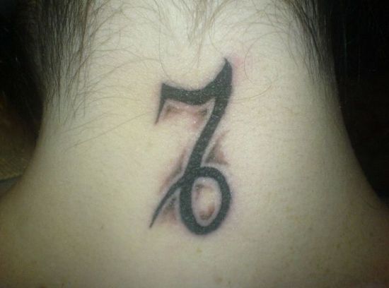 Black Ink Capricorn Symbol Tattoo On Nape