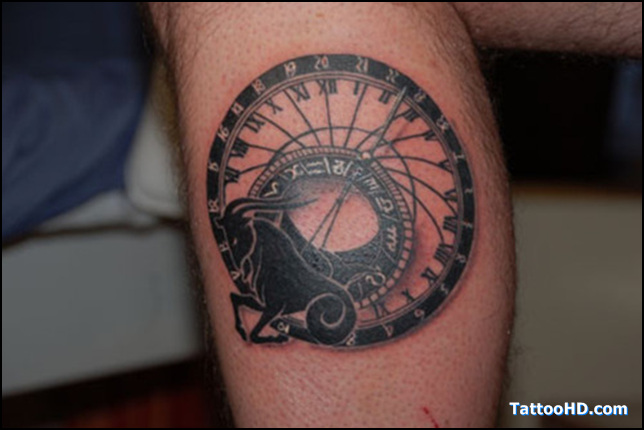 Black Ink Sun Sign Capricorn Tattoo On Leg
