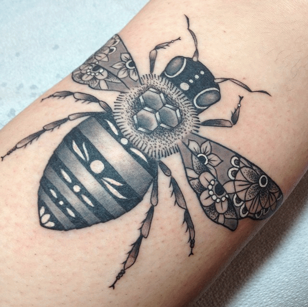 Black Ink Traditional Bee Tattoo Design For Arm