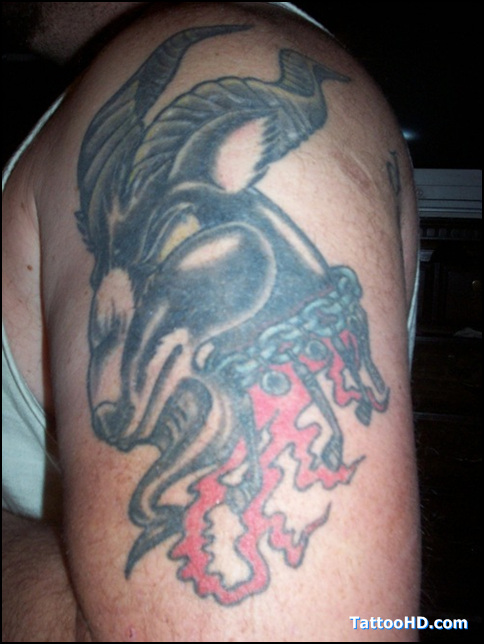 Capricorn Head With Flamers Tattoo On Half Sleeve