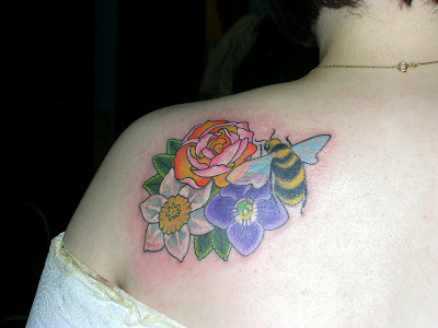 Colorful Flowers With Bee Tattoo On Left Back Shoulder