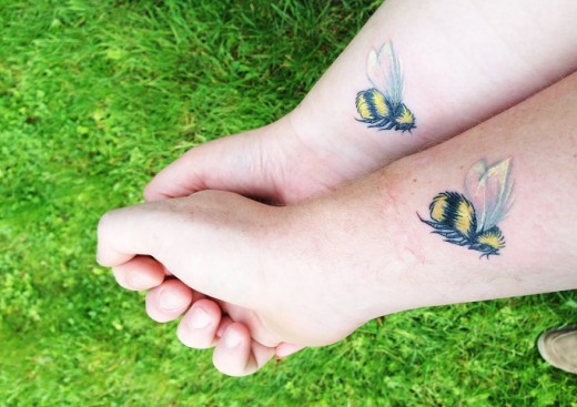 Cool Bee Tattoo On Couple Wrist