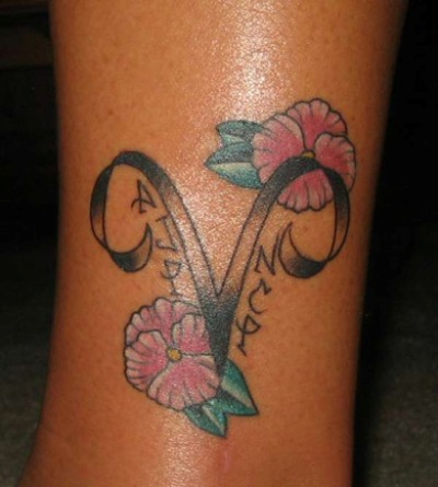Flowers And Capricorn Tattoo Sun Sign Tattoo