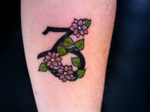Flowers And Girly Capricorn Sun Sign Tattoo