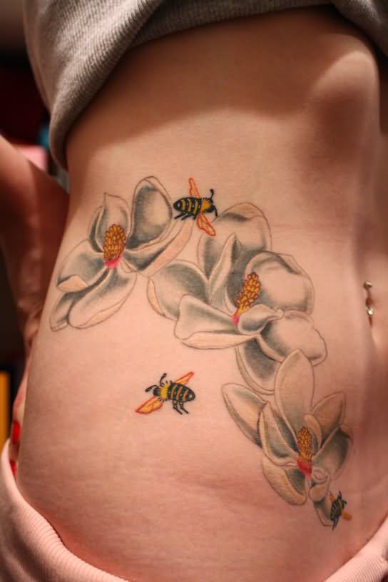 Flying Bees And Flowers Tattoo On Girl Side Rib