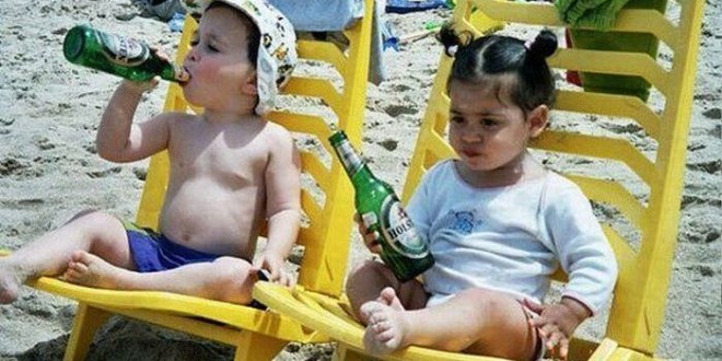 Funny Kids Drinking Beer On Beach