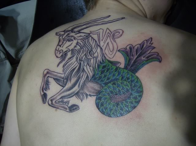 Goat Capricorn Tattoo On Man Upper Back