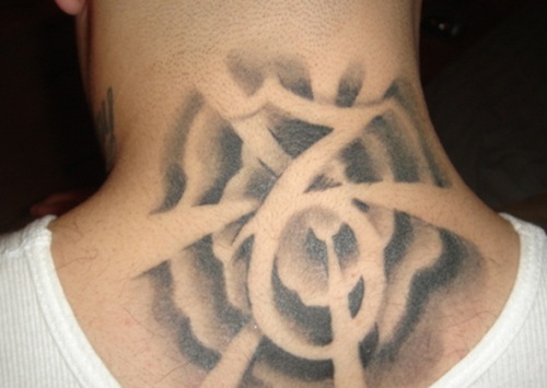 Grey Ink Capricorn Tattoo On Nape For Men