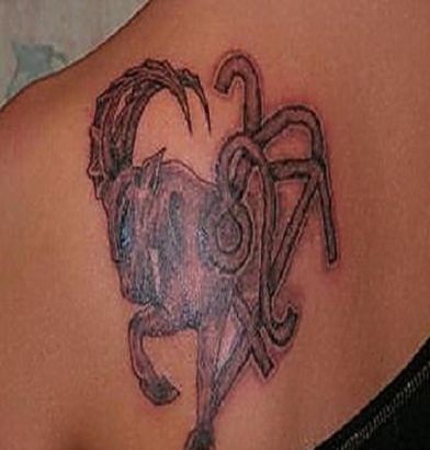 Grey Zodiac Capricorn Tattoo On Left Back Shoulder