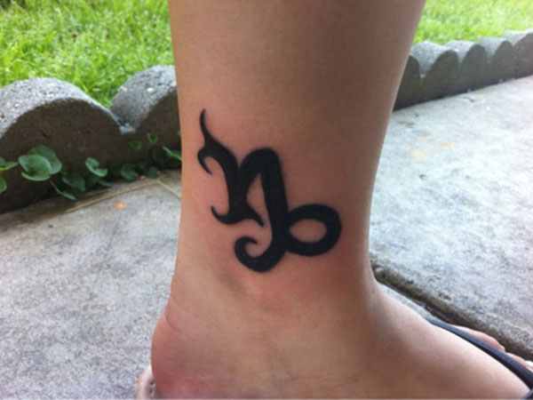 Nice Black Ink Capricorn Zodiac Tattoo