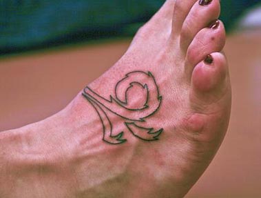 Outline Capricorn Sun Sign Tattoo On Right Foot