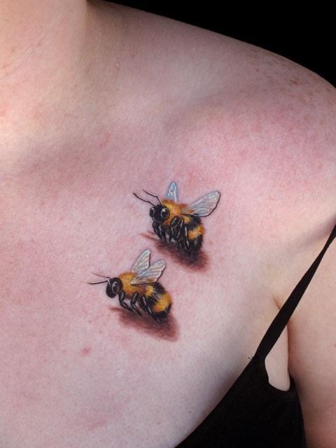 Realistic 3D Two Bee Tattoo On Girl Left Front Shoulder