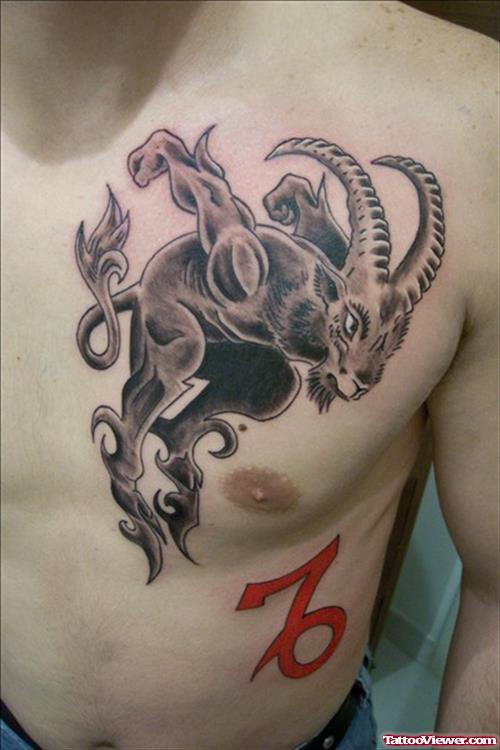 Red Capricorn Sign And Tribal Capricorn Tattoo On Chest For Men