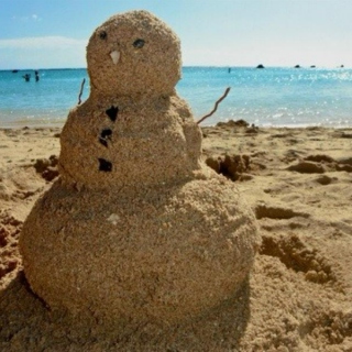 Snow Man As Sand Man On Beach Funny Picture
