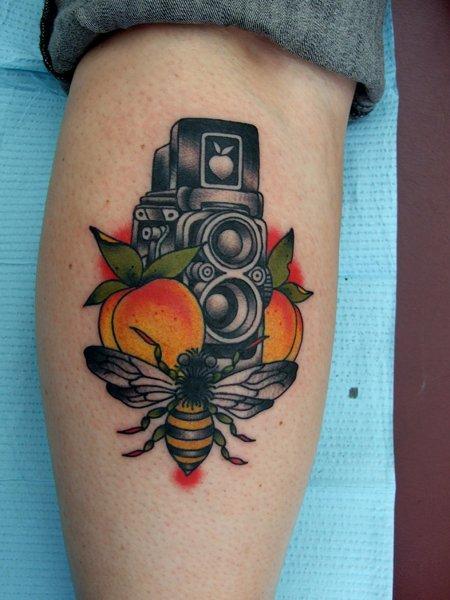 Traditional Bee With Old Camera Tattoo On Leg