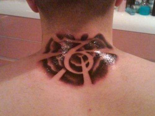 Tribal Capricorn Tattoo On Back Neck For Men