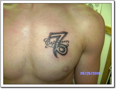 Tribal Capricorn Tattoo On Chest For Men
