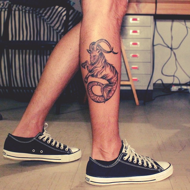 Tribal Capricorn Tattoo On Leg For Men