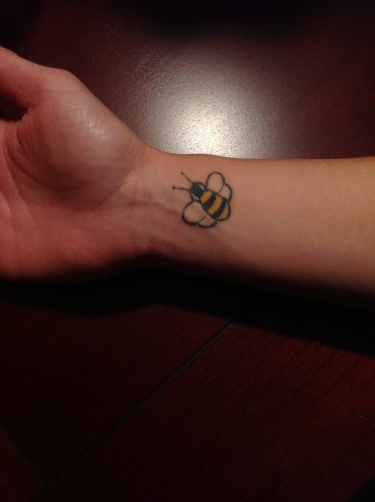 Yellow And Black Bee Tattoo On Wrist