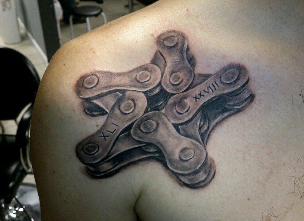 3D Bike Chain Tattoo On Right Front Shoulder