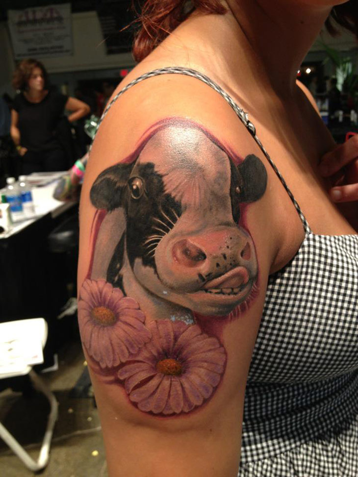 3D Cow Head With Flowers Tattoo On Girl Right Shoulder