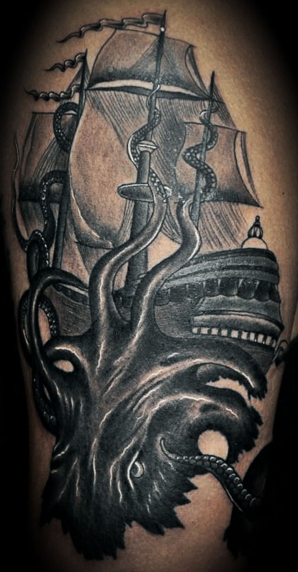 Amazing Black Ink Kraken Attacting Ship Tattoo Design