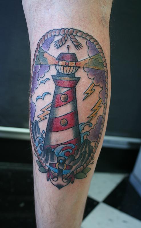 Anchor And Lighthouse Tattoo On Leg