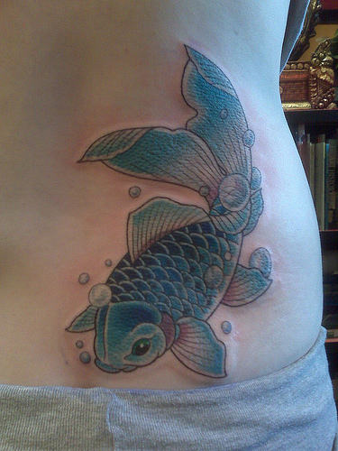 Aqua Color Fish Tattoo Design For Lower Back