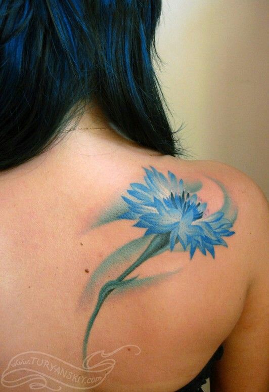 Aqua Color Flower Tattoo On Girl Right Back Shoulder