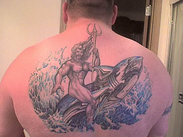 Aqua Greek God With Shark Tattoo On Man Upper Back