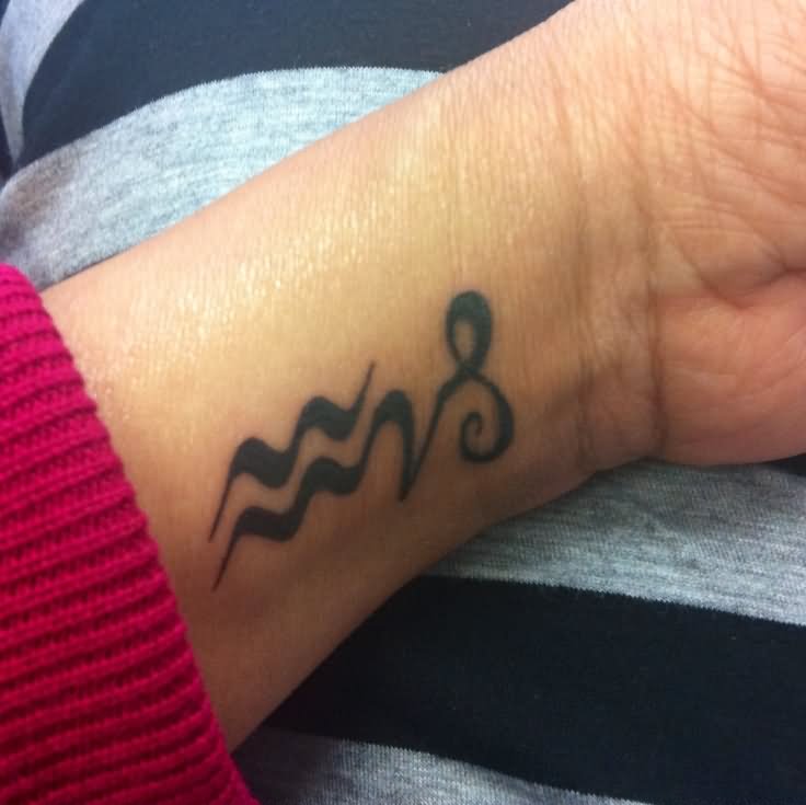 Aquarius And Capricorn Tattoo On Wrist For Girls
