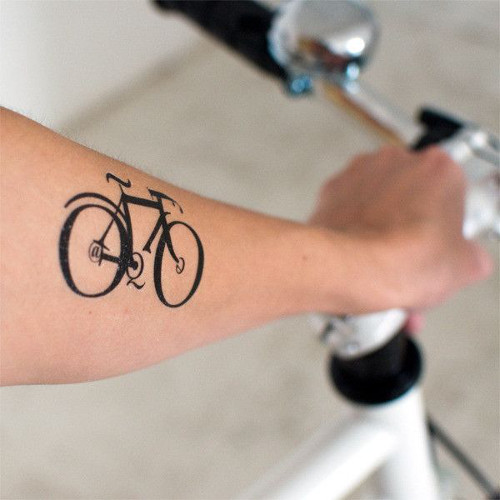 Attractive Black Bike Tattoo On Forearm